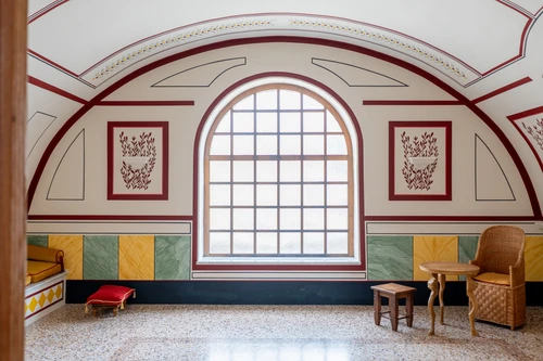 New spa facilities, walls painted in a Roman style, a large window on the back wall 
