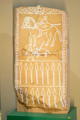 Stone stele depicting a horseman and spears in the Iberian exhibition at Mamuz