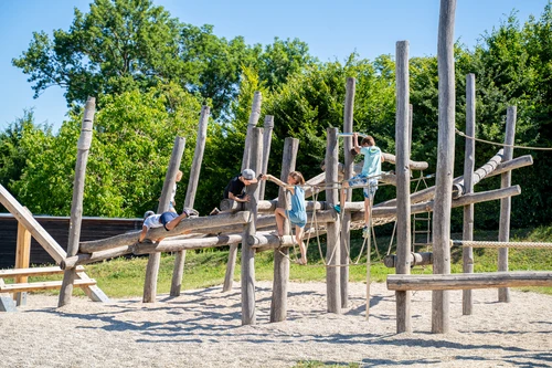 Children are playing at the playground in the Roman quarter