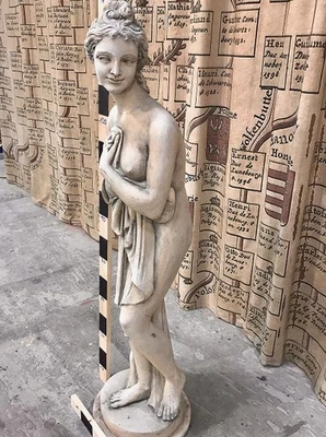 Antique female figure- statue sideways