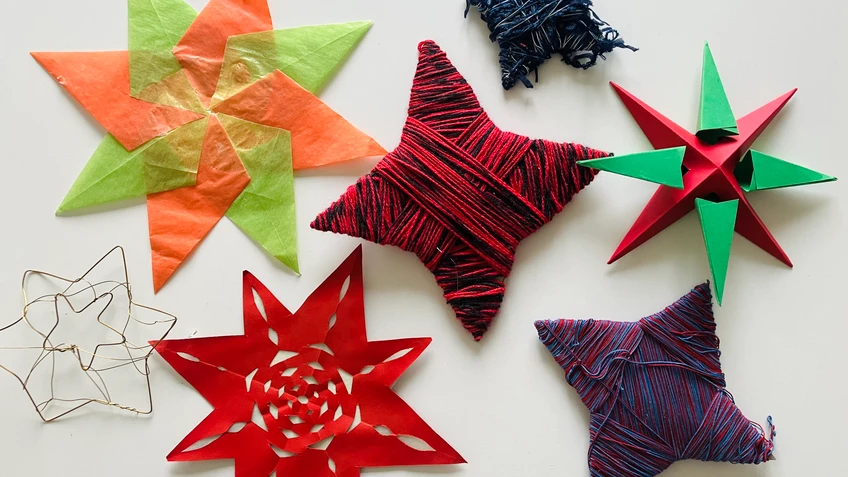 Selbstgemachte Sterne aus Stoff und Papier