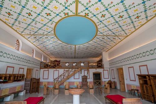The magnificent ceiling paintings in the reconstructed hall of the Roman baths