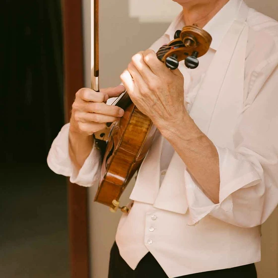 A man playing the violin