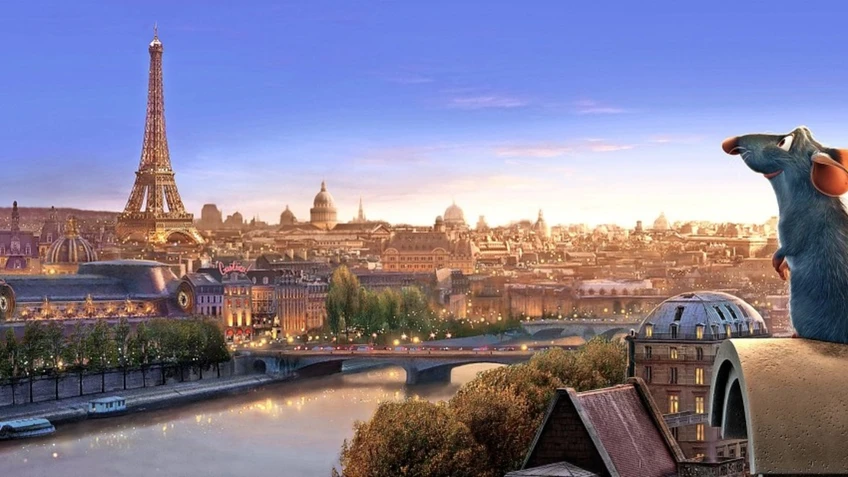 Zeichentrick: Ratte sitzt auf einem Giebel mit Blick über die Skyline von Paris, Eiffelturm im Hintergrund.