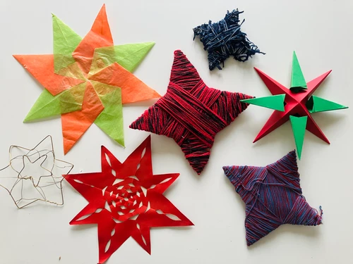 Selbstgemachte Sterne aus Stoff und Papier