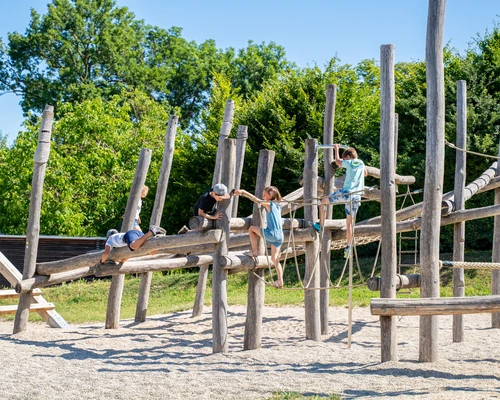 Children are playing at the playground in the Roman quarter