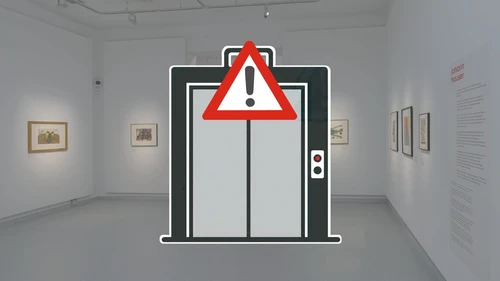 Notice of a broken elevator in the exhibition area.