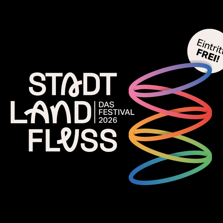 Hauptsujet des StadtLandFluss-Festivals 2026 mit der charakteristischen Spirale in Regenbogenfarben.