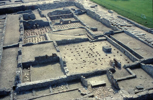 Historical photographs of the thermal baths area, with exposed wall structures 