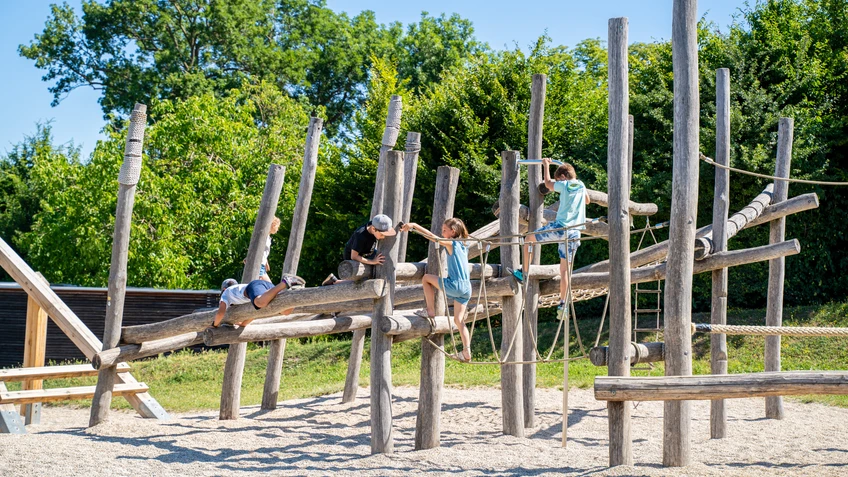 Children are playing at the playground in the Roman quarter
